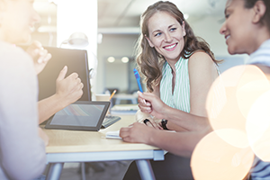 smiling people in a meeting